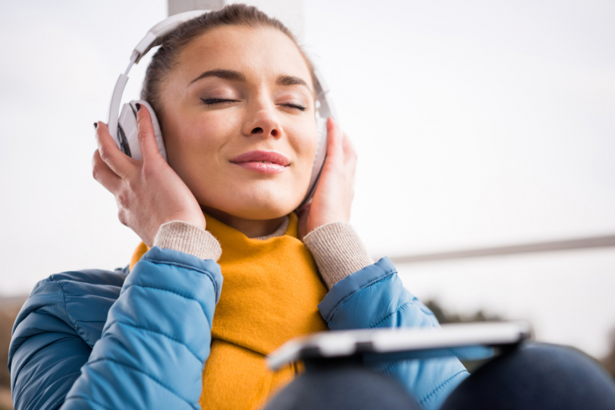 beautiful woman listening to music