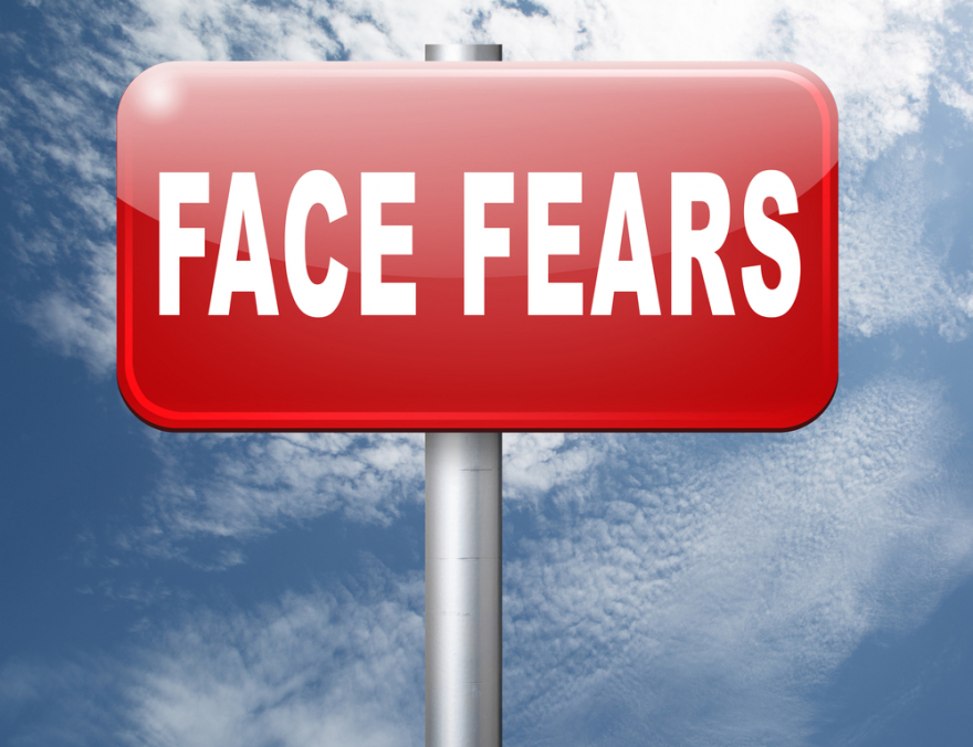 Face fears text on road sign