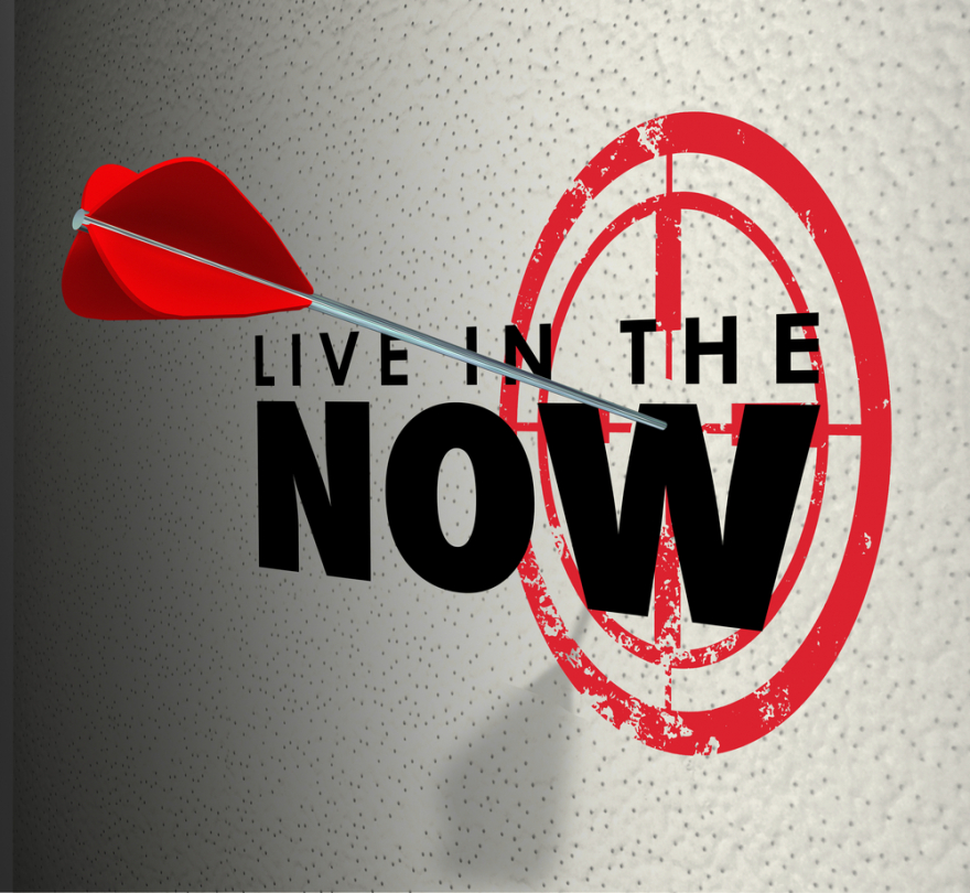 living in the now on a target wall