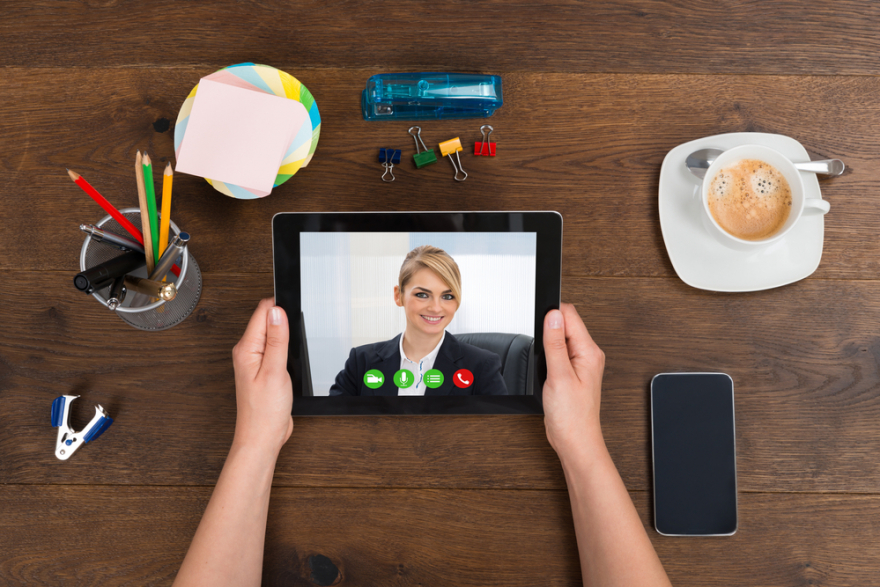 person video chatting on tablet