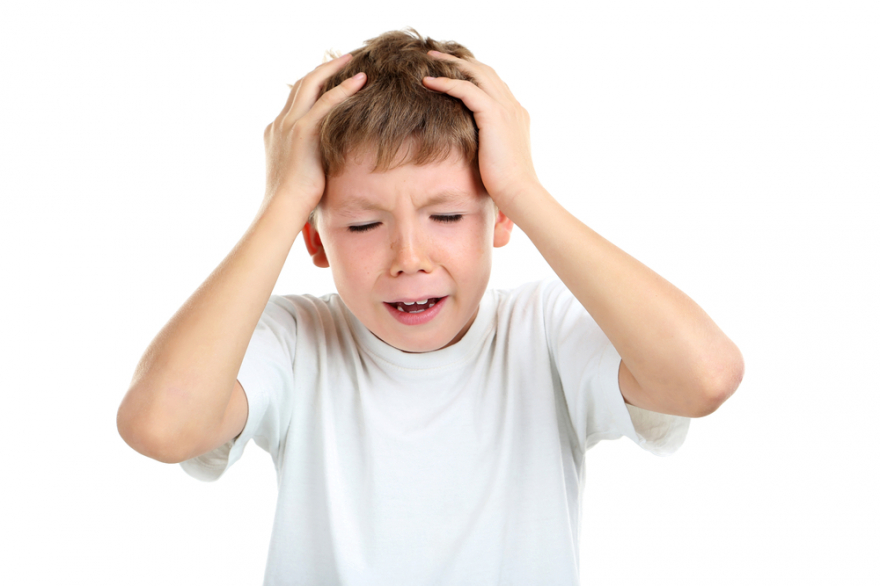 Portrait of a stressed little boy