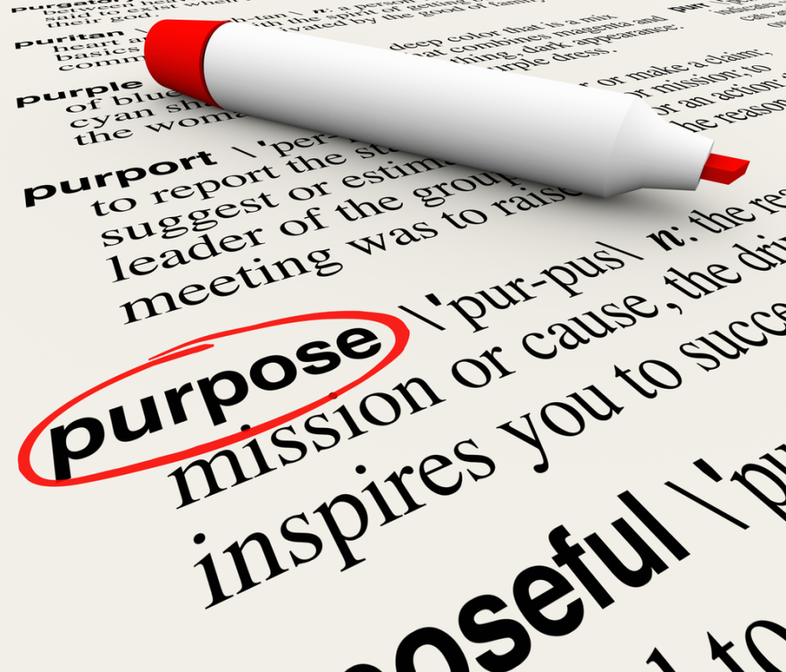 Purpose word circled on a page in the dictionary