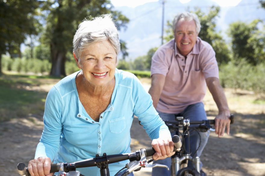 Senior couple on country bike rid