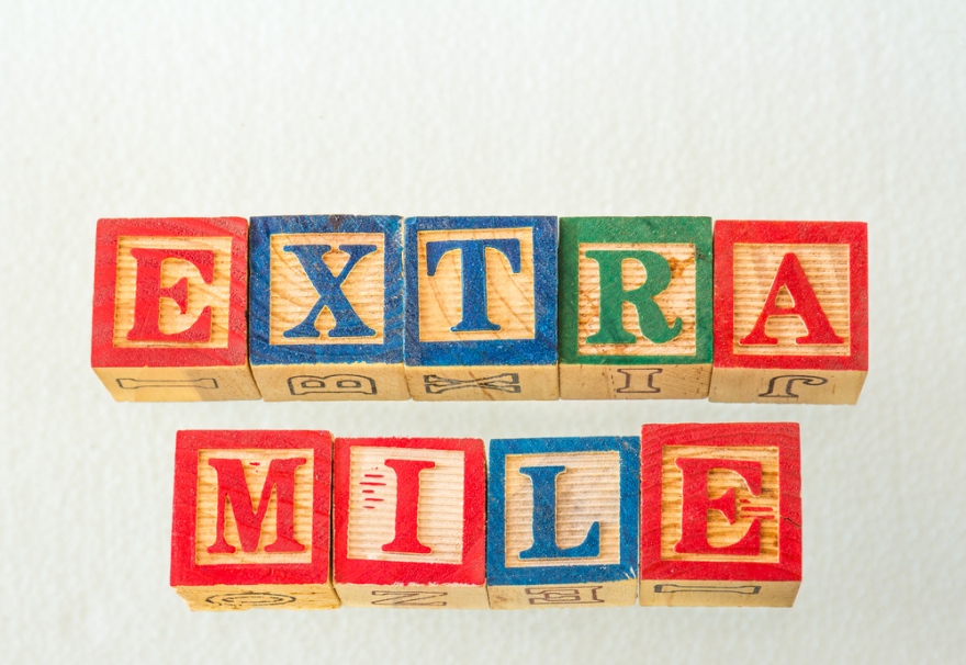 the words extra mile visually displayed