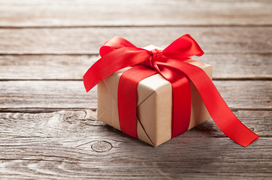 Valentines day gift box on wooden background