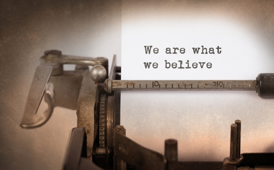 we are what we believe written on an old typewriter